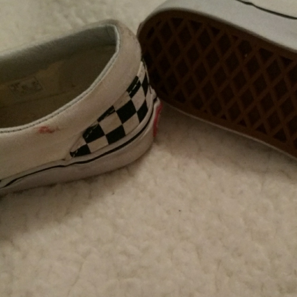 Black and white checkered slip on Vans